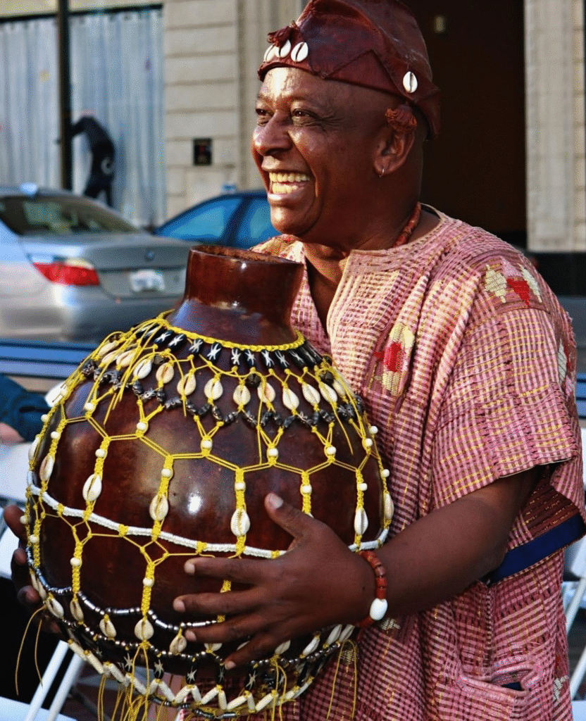 Yagbe Awolowo Onilu with Shekere
